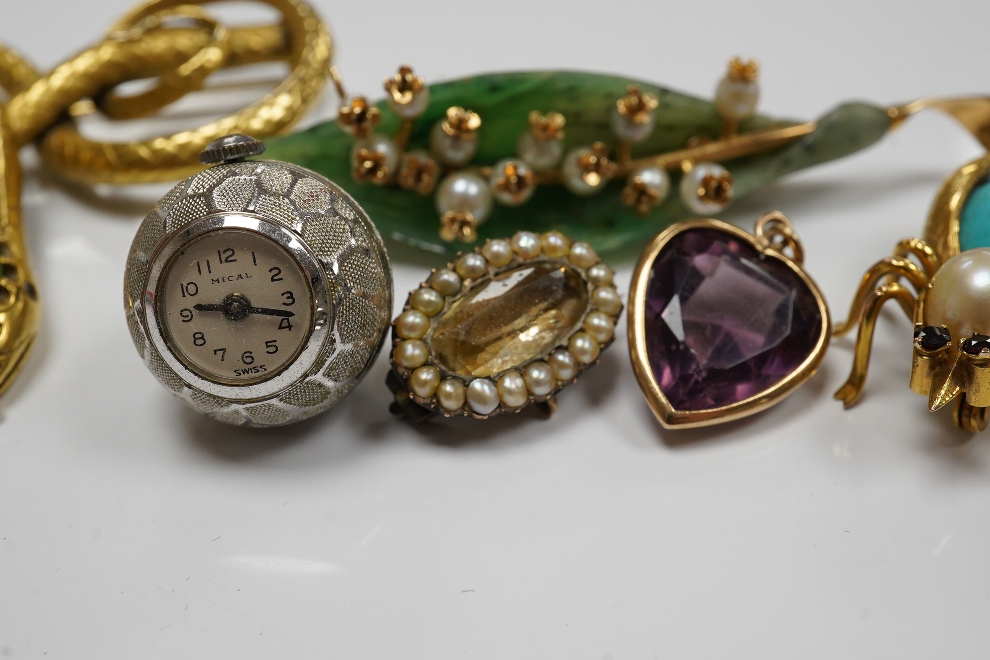 Assorted jewellery including gold plated serpent brooch, an 18k bust charm, 14k, turquoise and cultured pearl set bug brooch, etc. Condition - fair to good